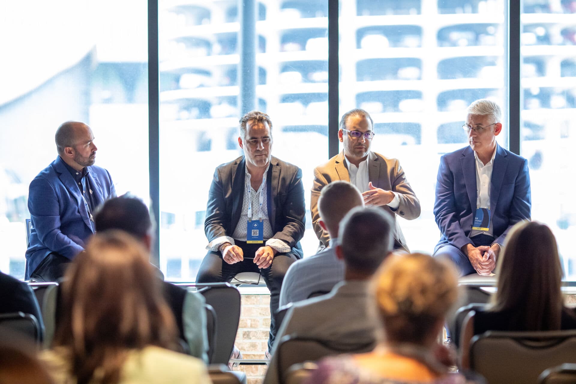 Individuals present to executives in conference room at Shore Capital Partners in Chicago